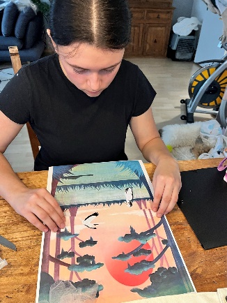 Jana working on the landscape reference painting